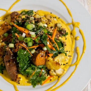 Close up of kale salad on a white plate