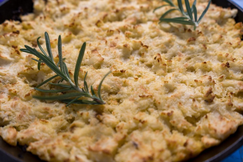 Close up of the surface of a shepherd's pie