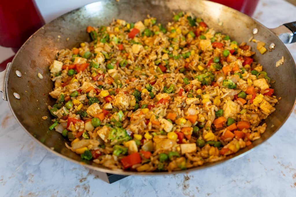 Veggie Fried Rice in a Wok on a counter.