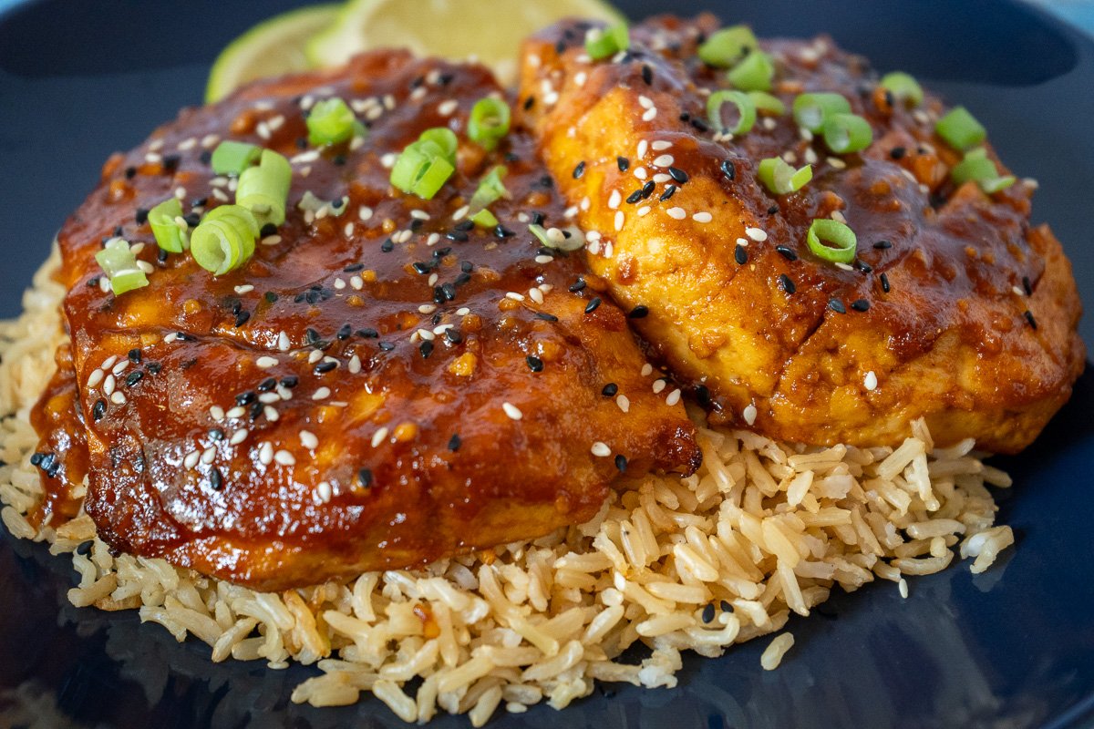 Honey Sriracha Tofu cutlets on a bed of rice