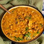 A bowl of creamy black eyed peas soup